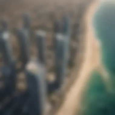 Aerial view of JBR Tower surrounded by Jumeirah Beach and urban developments.